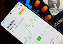 Mobile screen displaying an investment app with a stock market graph
