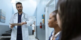 A doctor discussing with a patient in a medical office